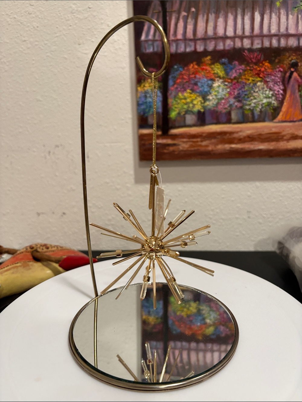 Kendra Scott Gold Starburst Ornament with Branded Tag and ornament hanger